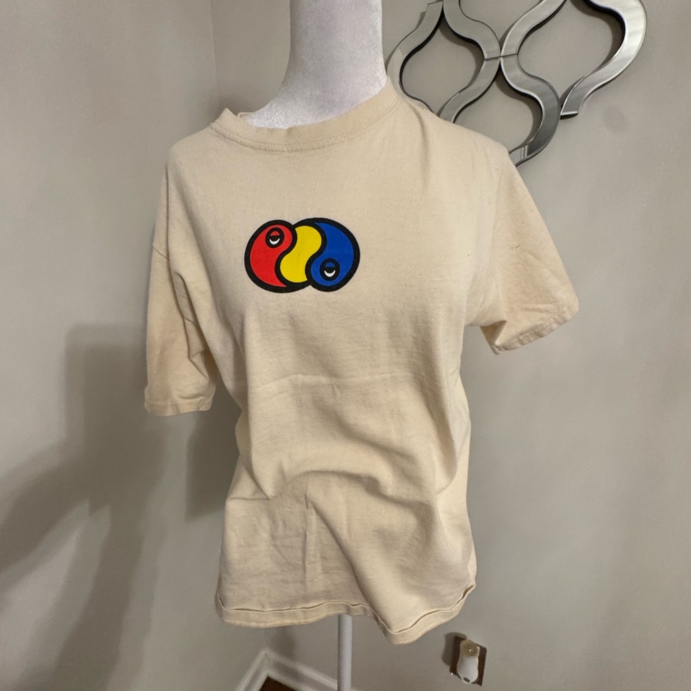 Beige Graphic Tee with Colorful Design